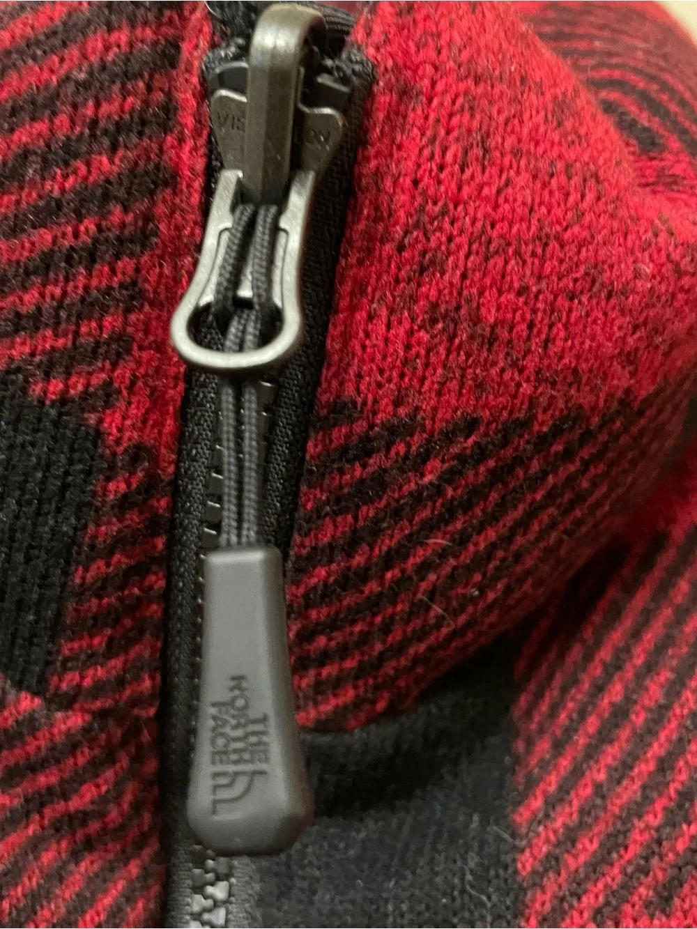The North Face Nuptse 700 puffer vest Size M. buffalo plaid design on the yoke.